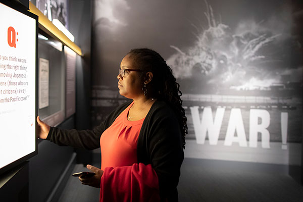 A Museum Teacher Fellow explores the Americans and the Holocaust exhibition in 2019. US Holocaust Memorial Museum