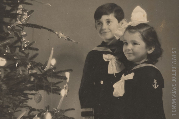 Two Jewish children pose for their father, a professional photographer, who would later use the picture to save their lives. US Holocaust Memorial Museum, gift of Gavra Mandil