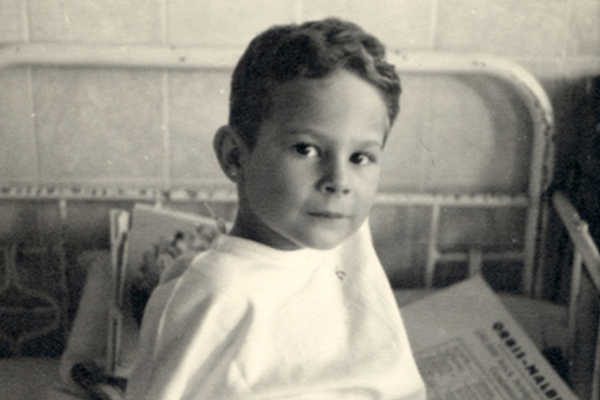Robert Wagemann, a physically disabled Jehovah's Witness child, sits on his hospital bed in Berlin, circa 1942–43. US Holocaust Memorial Museum, courtesy of Robert Wagemann