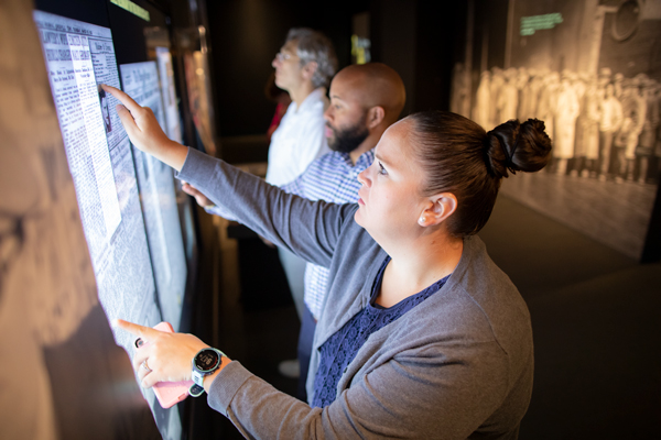 A Museum Teacher Fellow explores the Americans and the Holocaust exhibition in 2019. US Holocaust Memorial Museum