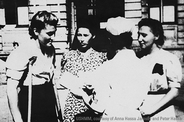 A nurse converses with three Polish female survivors of the Ravensbr&uuml;ck concentration camp who had been subjected to medical experimentation during their imprisonment. Pictured from left to right are Maria Kusmierczuk, Wladislawa Karolewska, and Jadwiga Dzido in Poland, 1946. US Holocaust Memorial Museum, courtesy of Anna Hassa Jarosky and Peter Hassa