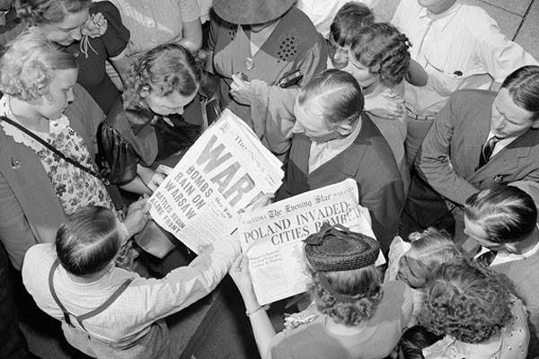 People look at Washington, DC, newspapers on September 1, 1939—the day Nazi Germany invaded Poland, starting World War II. Harris &amp; Ewing Collection/Library of Congress