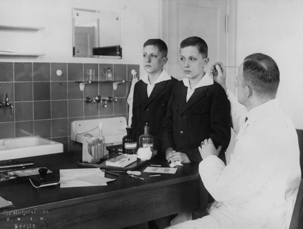 As the head of the Kaiser Wilhelm Institute’s Department for Human Heredity, Dr. Otmar von Verschuer, a physician and geneticist, examined hundreds of pairs of twins to study whether criminality, feeble-mindedness, tuberculosis, and cancer were inheritable. Archiv zur Geschichte der Max-Planck--Gesellschaft, Berlin-Dahlem