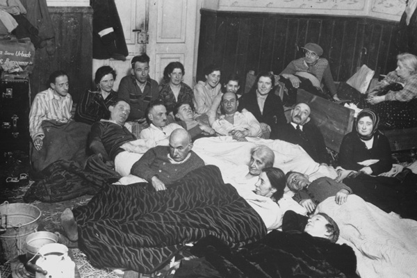 Jewish men and women from Vienna live in crowded barracks in the Opole Lubelskie ghetto in German-occupied Poland, 1941. US Holocaust Memorial Museum, courtesy of Lilli Schischa Tauber