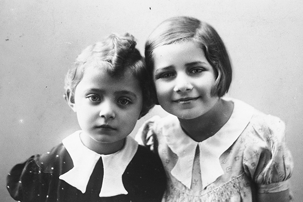 Gabriella and Katerina Frei of Holice, Czechoslovakia, pose for a studio portrait, circa 1935–37. On May 18, 1944, they were deported to Auschwitz, where they were murdered. US Holocaust Memorial Museum, courtesy of Vera Meisels
