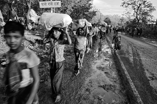 The north-south highway between Cox&rsquo;s Bazar and Teknaf in Bangladesh sees a steady flow of Rohingya refugees in September 2017. Greg Constantine for the US Holocaust Memorial Museum